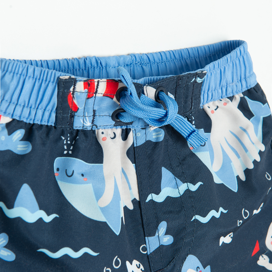 Dark blue swim trunks with sea life print