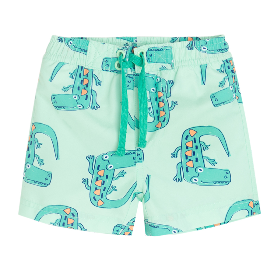 Lime swim trunks with crocodiles print