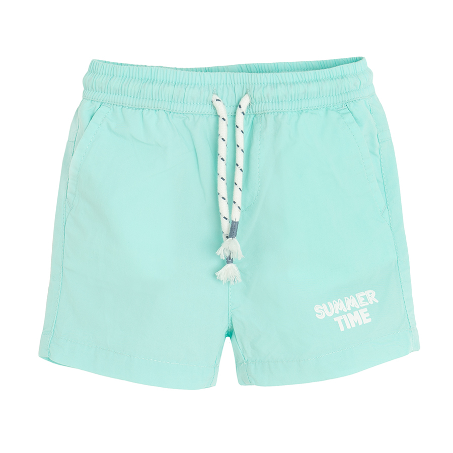 Light turquoise shorts with cord on the waist