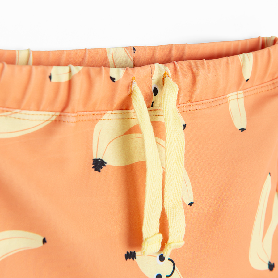 Beige shorts with bananas print