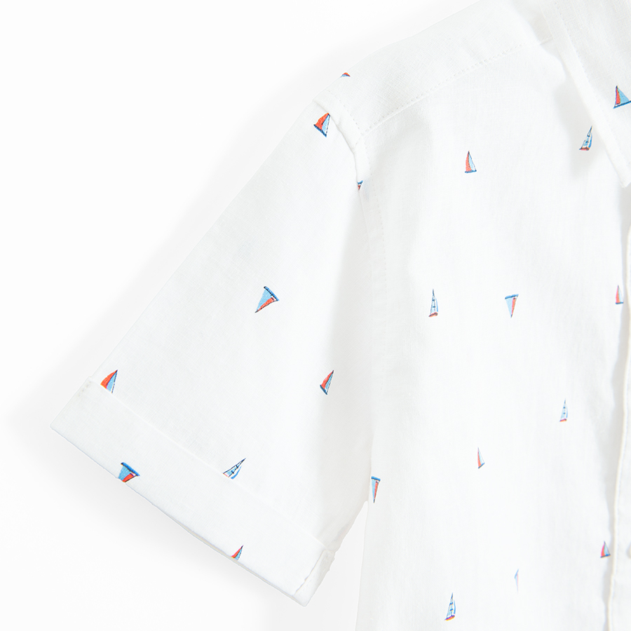 White short sleeve button down shirt with small boats print