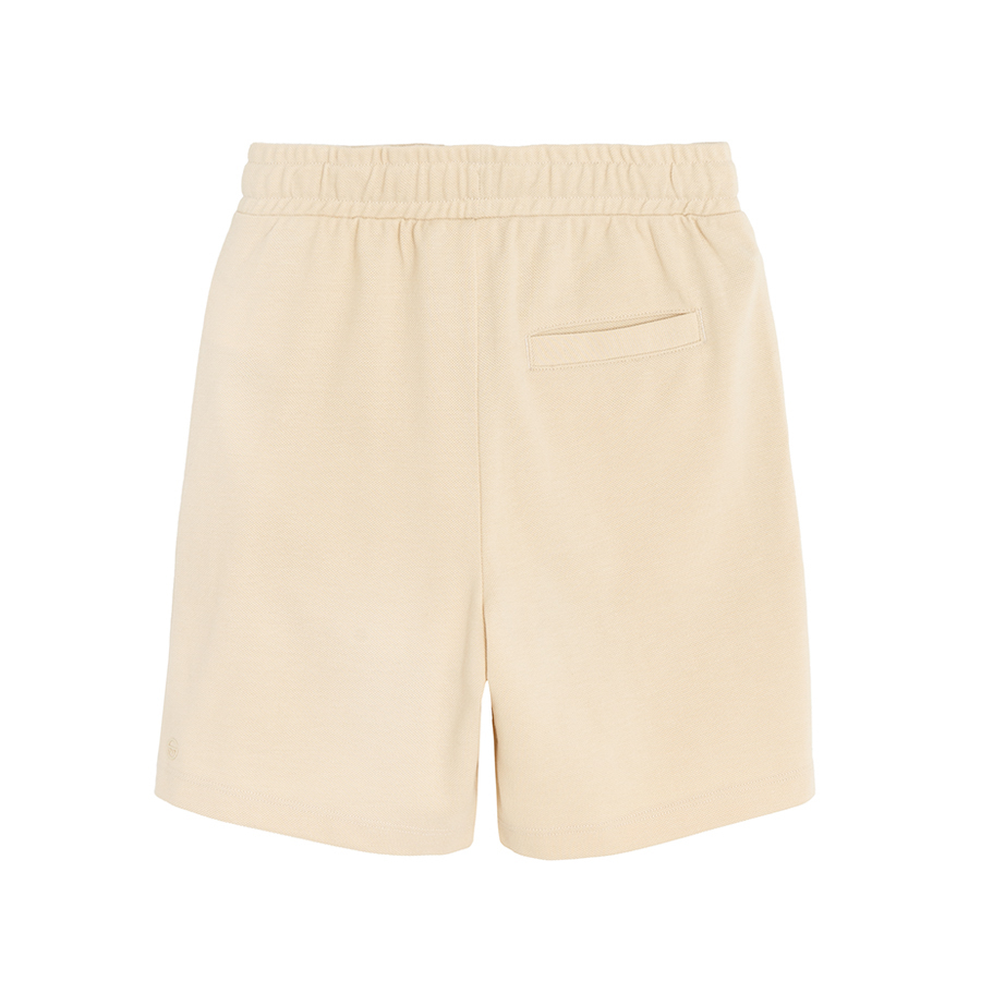 Beige shorts with cord on waist