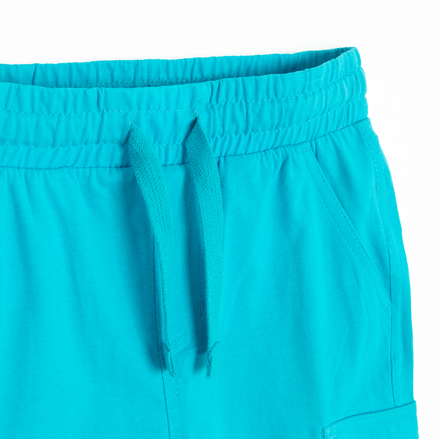 Blue shorts with cord on the waist