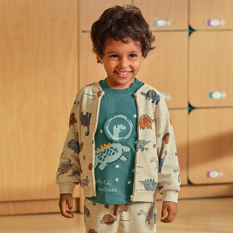 Ecru zip through sweatshirt with dinosaurs and planets print