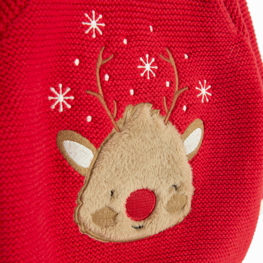 Red sweater with raindeer print