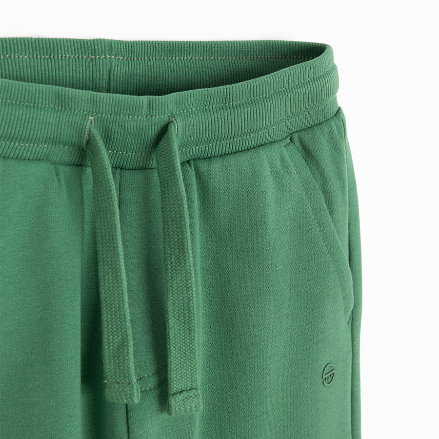 Green jogging pants