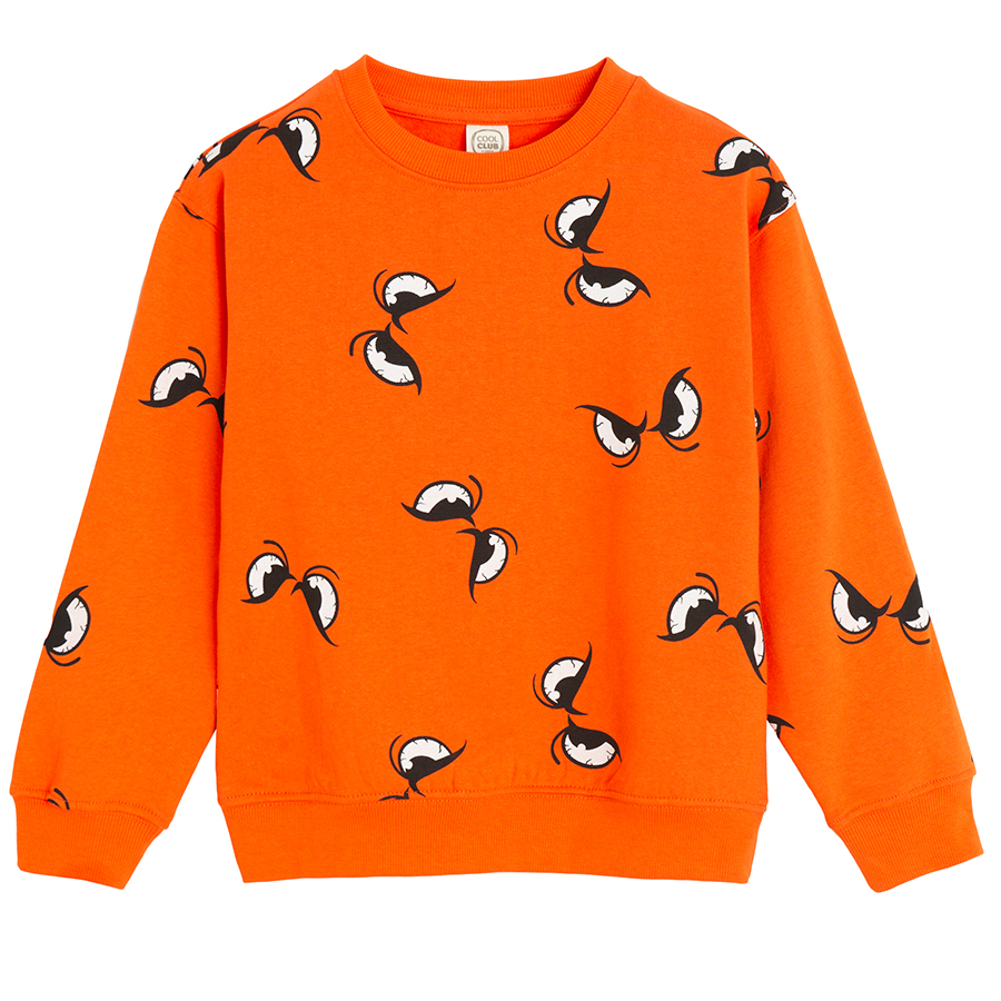 Orange sweatshirt with eyes print