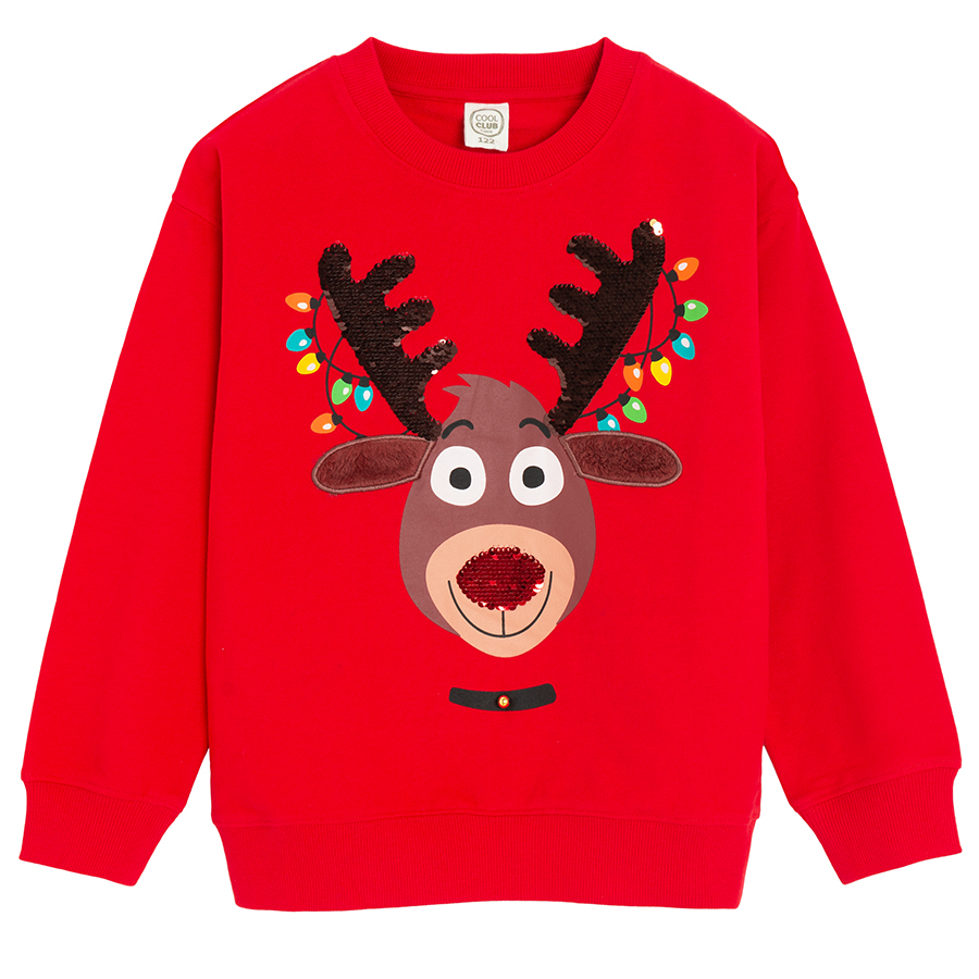 Red sweatshirt with raindeer print