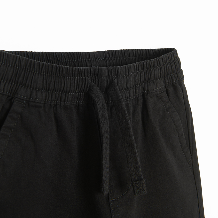 Black trousers with corded waist