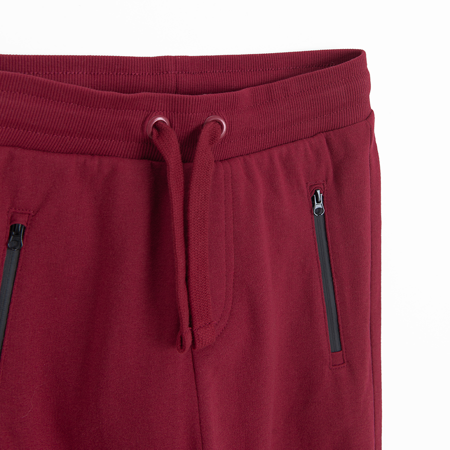 Red sweatpants with cord