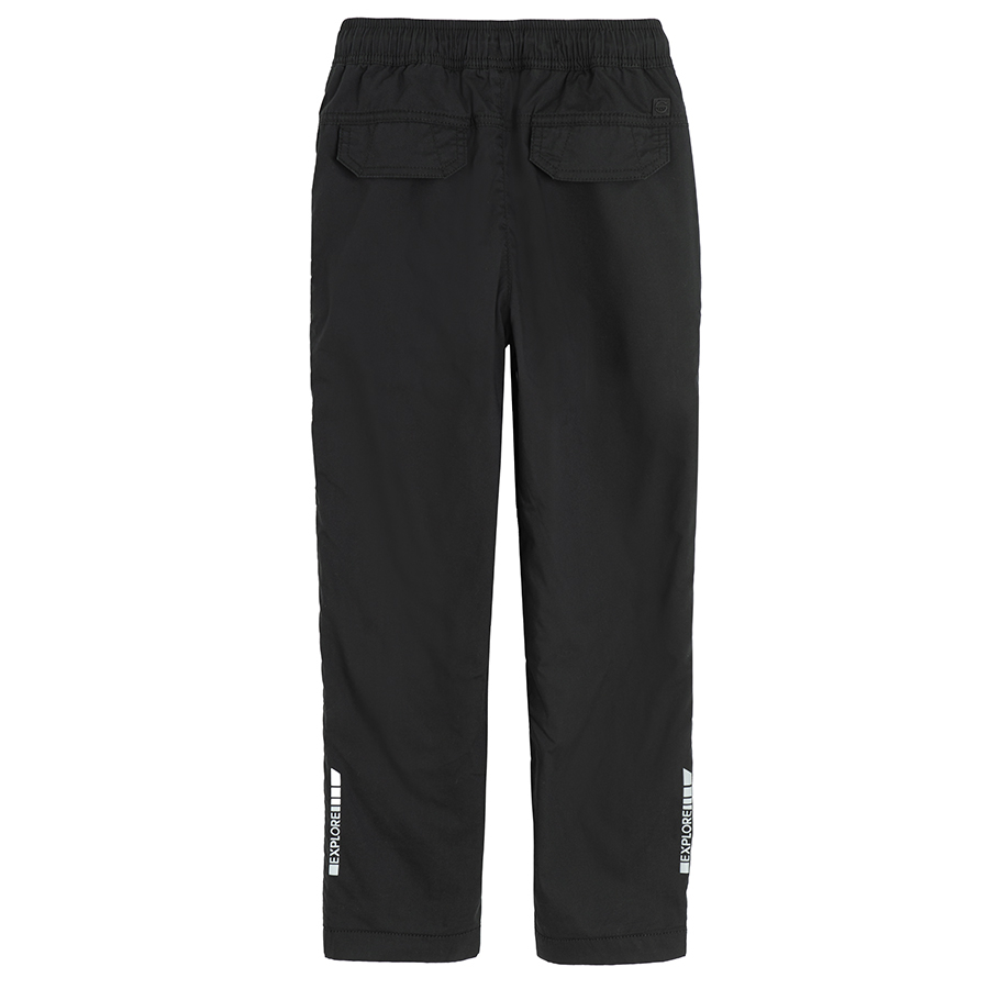 Black trousers with side pockets