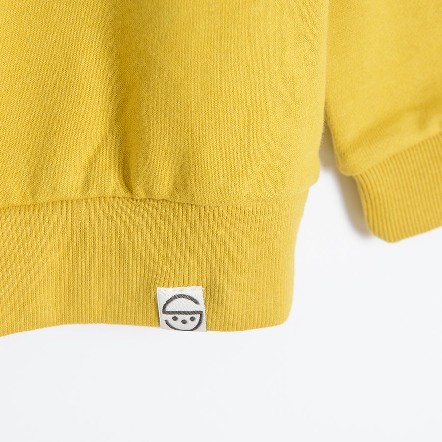 Yellow sweatshirt