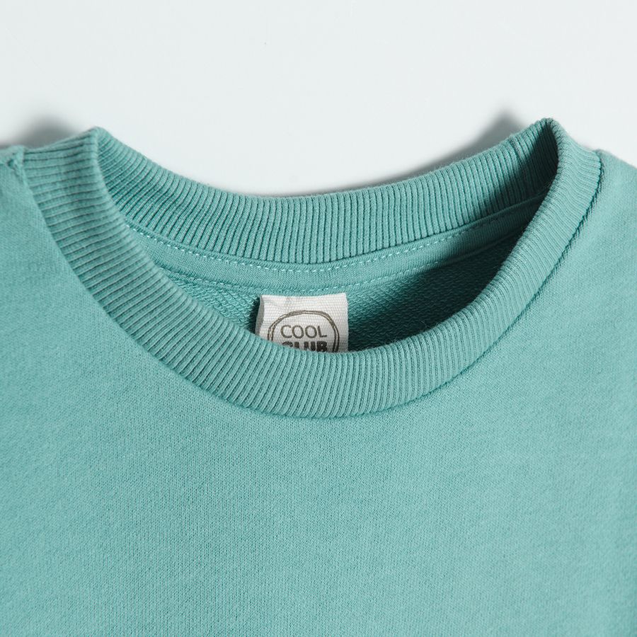 Turquoise sweatshirt