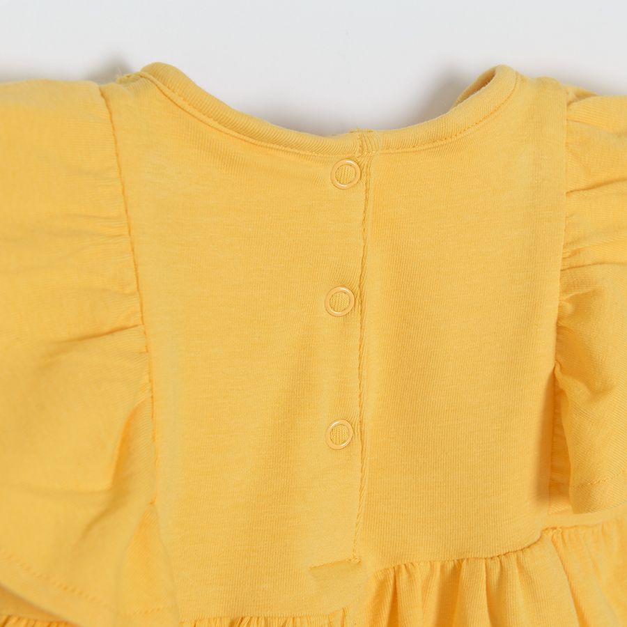 Yellow sleeveless dress/bodysuit with ruffle on the shoulder and embroidered top