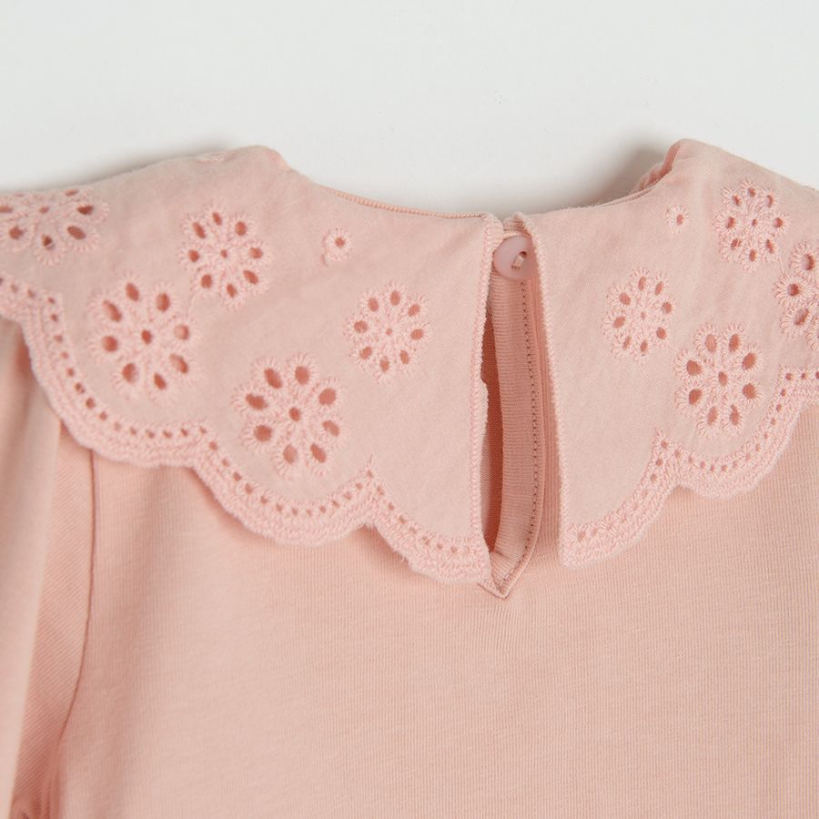 Light pink bodysuit with embroidered ruffle on the neckline