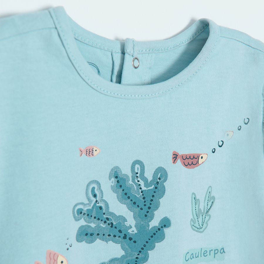 Light blue short sleeve T-shirt with sea world print and ruffles in the side