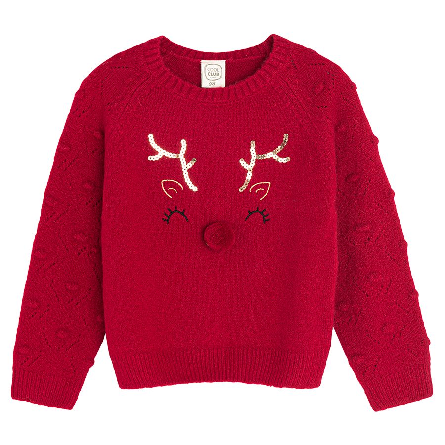 Red sweater with raindeer print