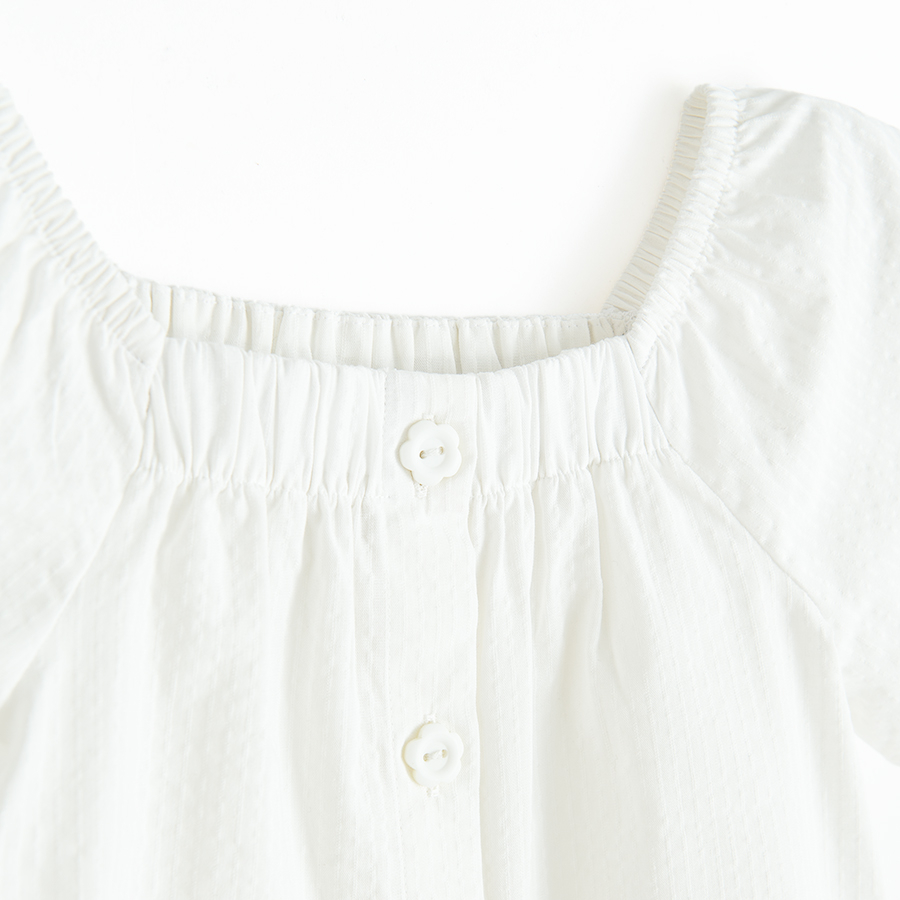 White shirt with ruffle sleeves