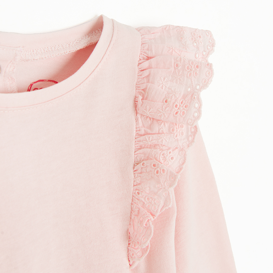 Pink blouse with ruffles