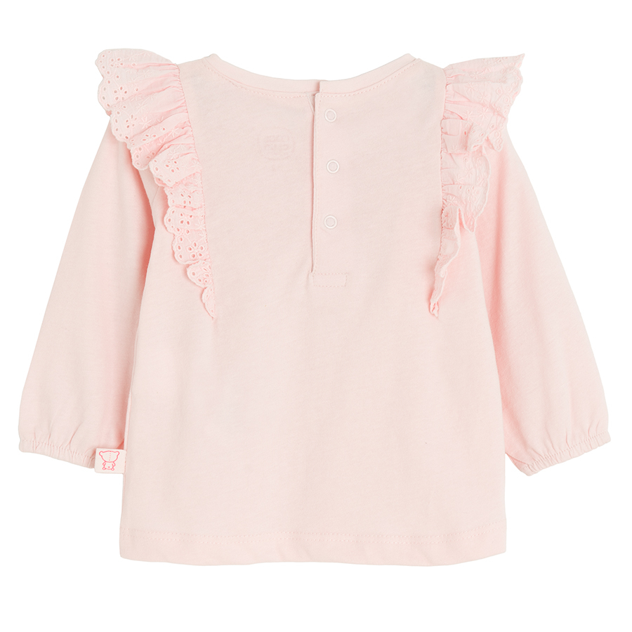 Pink blouse with ruffles