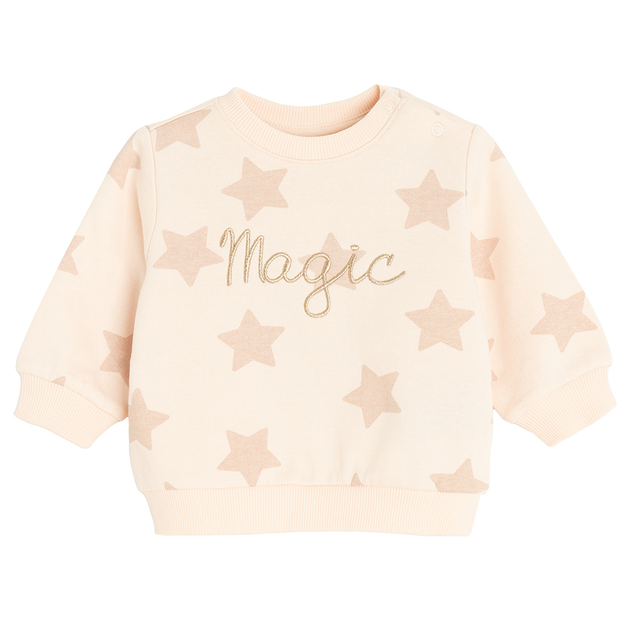 Pink jogging set with stars and Magic print