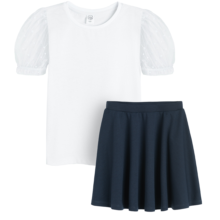 White short sleeve blouse with puffy sleeves and blue skirt