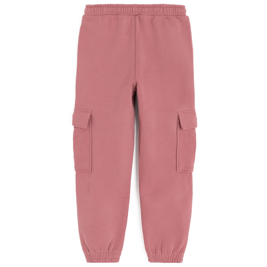 Warm pink jogging pants with external pockets