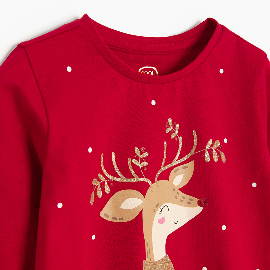 Red blouse with raindeer print