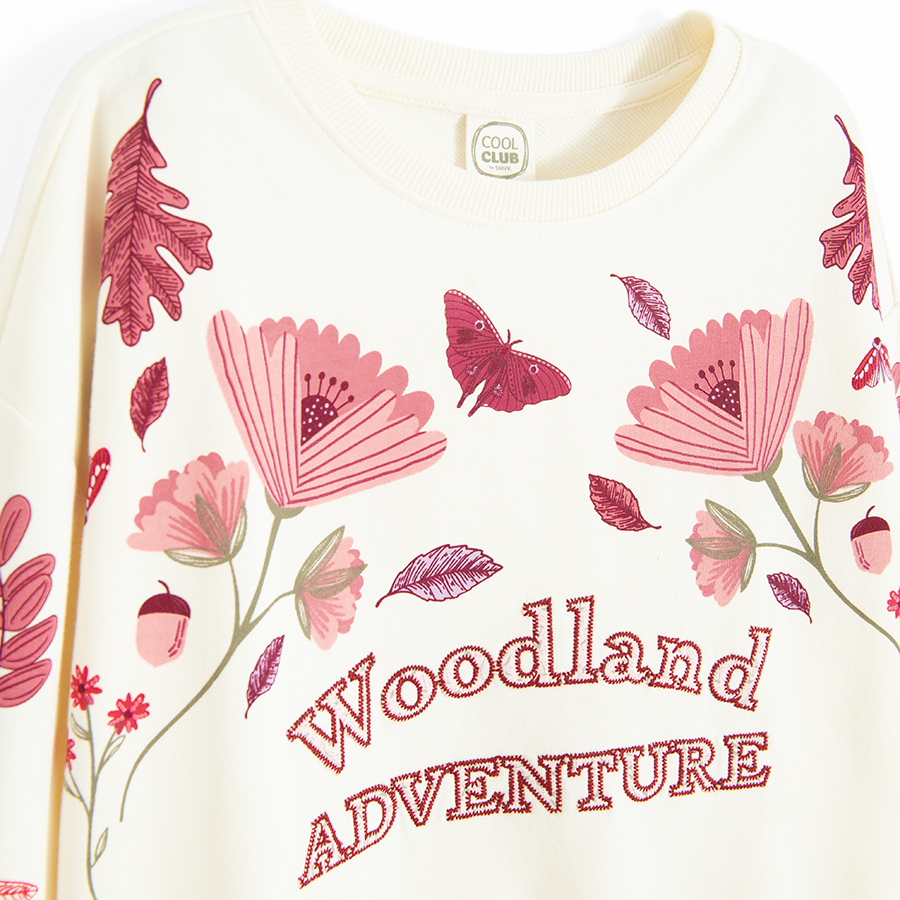 White sweatshirt with red flowers and Woodland Adventure print