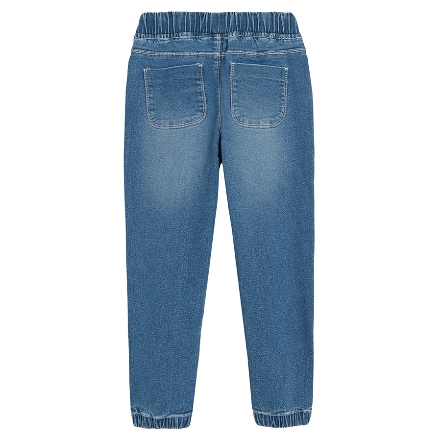 Denim trousers with adjustable waist