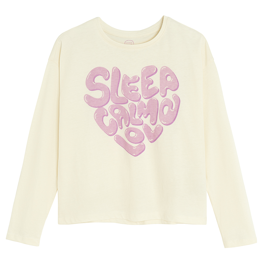 White long sleeve blouse with SLEEP CALM LOVE pring and pink pants with hearts pyjamas