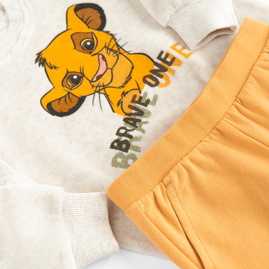 Lion King ecru long sleeve blouse and yellow joggins pants set - 2 pieces