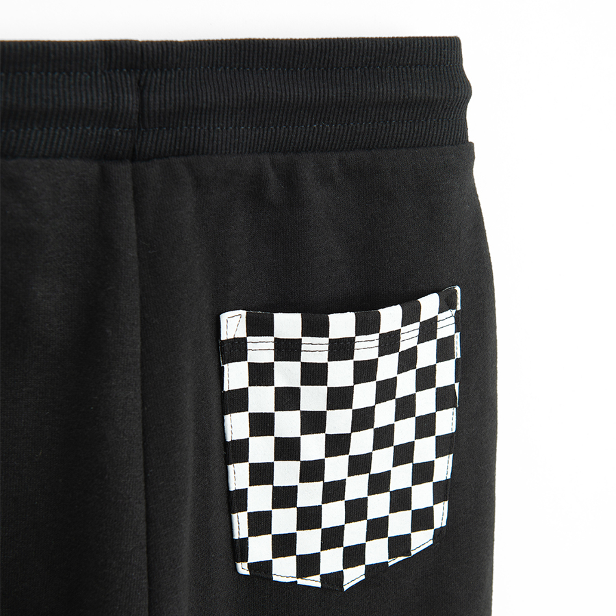 Jogging pants black with TEAM SQUARE PANTS print HOT WHEELS