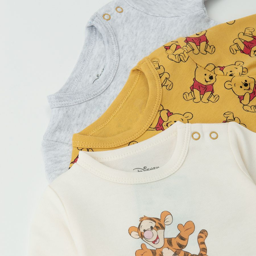 Winnie the Pooh white and yellow long sleeve bodysuits- 3 pack