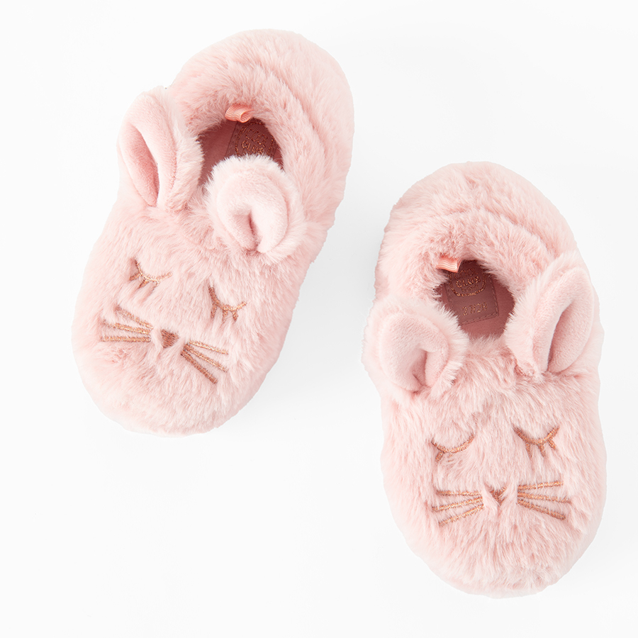 Pink home slippers with bunny shape