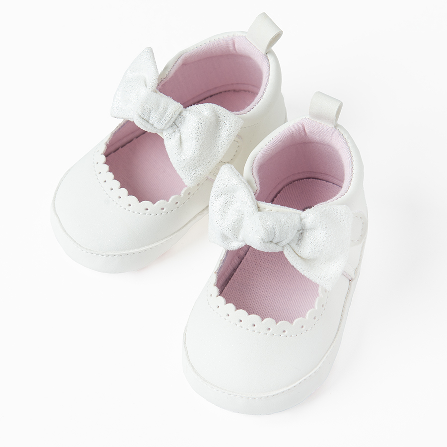 White shoes with bows