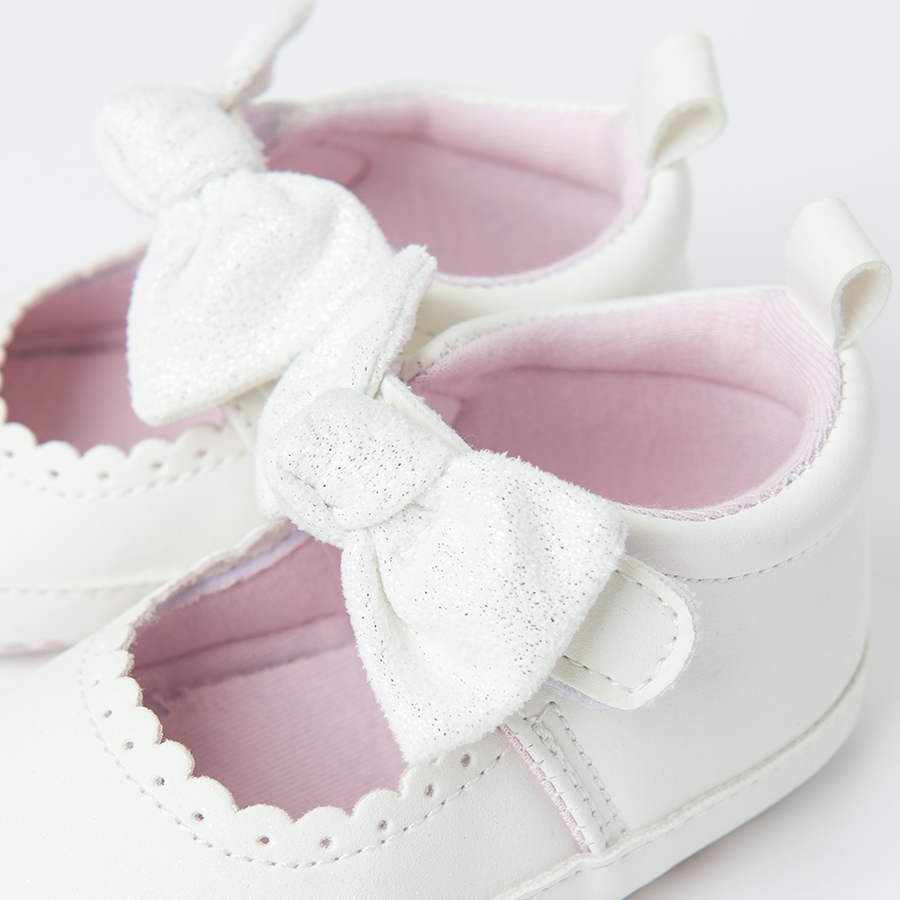 White shoes with bows